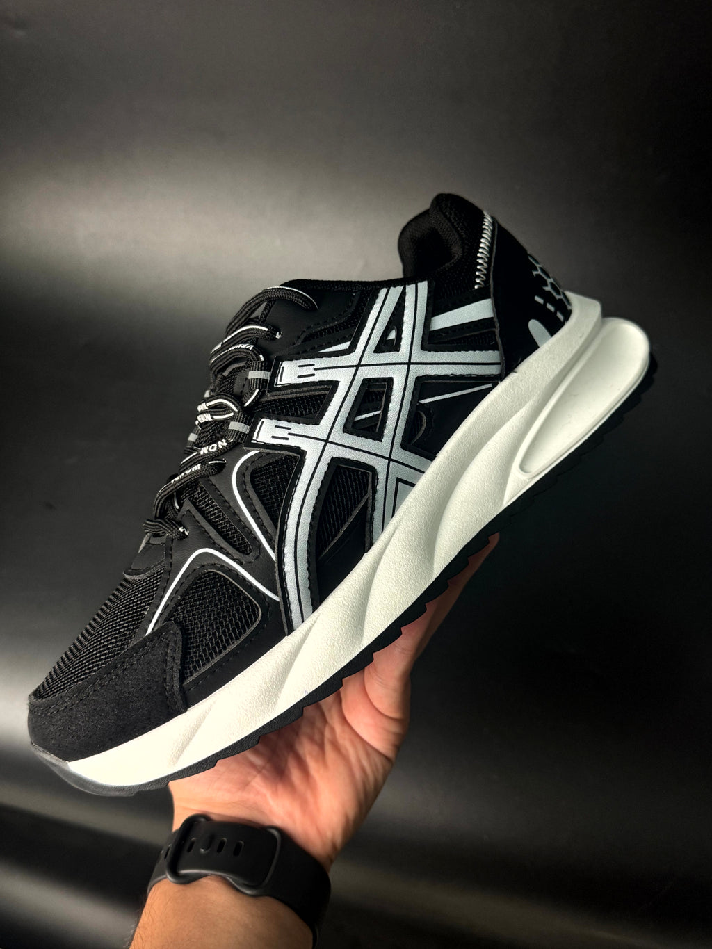 - asics gel venom noir -